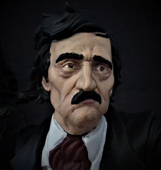 My attempt at painting a dour Edgar Allan Poe. Not too bad if I do say so myself.